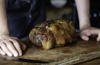 Roasted topside of beef ready to be carved