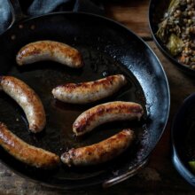 Coarse sausages, lentils & cavolo nero