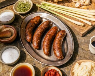 Sausages appear in great food cultures all over the world. We never tire of discovering them, and we always want to represent them properly. Which is why we love to make them in partnership with chefs, cooks, or true specialists in that cuisine, or passionate enthusiasts who know it from the inside.

This is Kwa Ko — a Cambodian beef sausage made in collaboration with @barang_london , the project of @tomgeoffrey. Since launching his residency at The Globe in Borough Market, Tom has been bringing the fresh, vibrant flavours of Cambodia to London’s restaurant scene. It didn’t take long before the conversation turned to sausages.

Cambodian sausage traditions are strong. What we’ve made together is genuinely distinctive: beef chuck and brisket with galangal, lemongrass, garlic, makrut lime leaves, white Kampot pepper and steamed jasmine rice. The rice is the detail that makes it, it gives the sausage a characteristic light sourness, another layer of complexity that sets it apart from anything we’ve made before.

Available now, in limited numbers, so be quick!