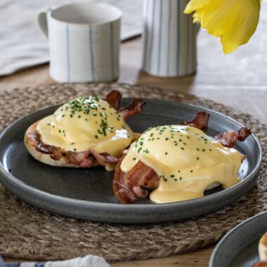 Bacon and poached egg muffins with hollandaise.