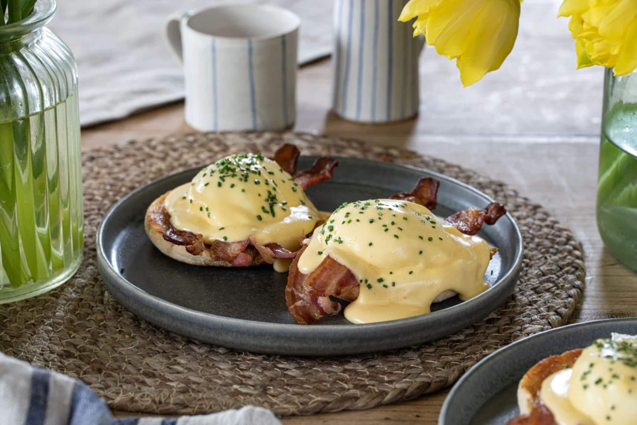 Bacon and poached egg muffins with hollandaise.