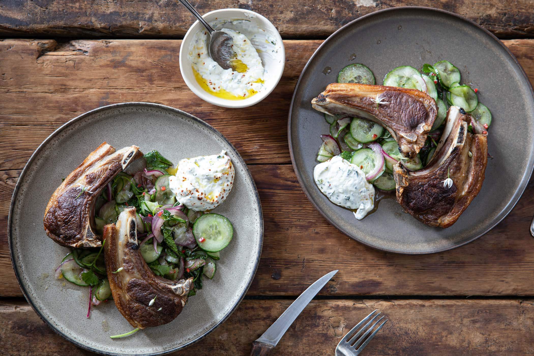 Cucumber, onion and herb salad, served with lamb chops and minted yoghurt.
