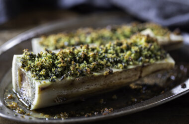 Close-up of bone marrow canoes with a garlic and parsley crumb.