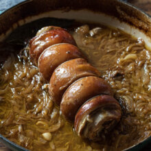 Rolled lamb breast, braised w/ onions & anchovies
