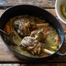 Slow-cooked lamb shanks recipe w/ buttered jersey royals
