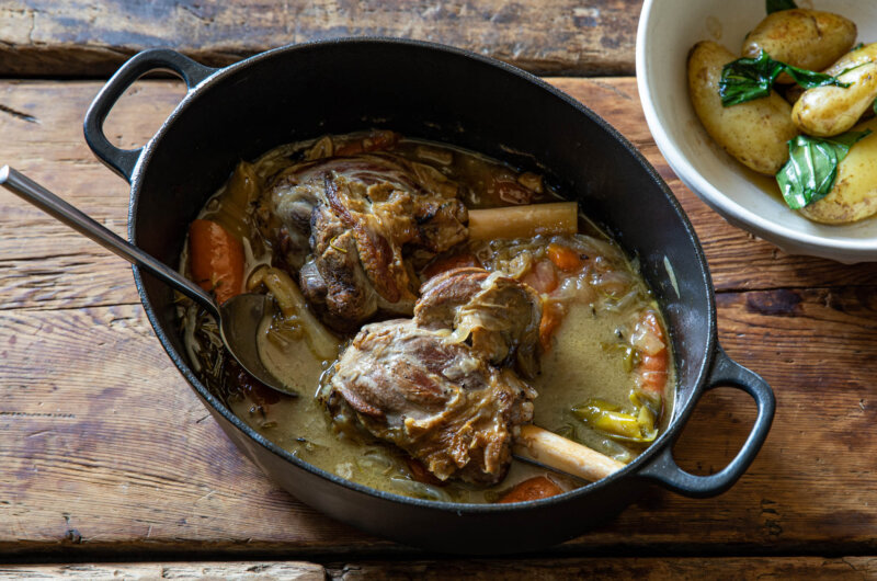 Lamb shanks recipe are the perfect cut for slow cooking, simply braised with lots of lovely vegetables and served with buttered Jersey Royals.