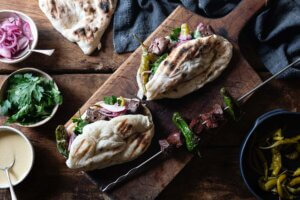 Ox Heart with Flatbread, Tahini Dressing & Pickled Chillies