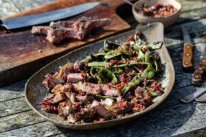 Barbecued Barnsley Chops with Charred Flat Beans & Black Olive Dressing