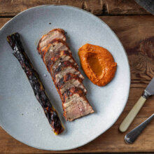 Pork tenderloin recipe w/ romesco sauce & black leeks