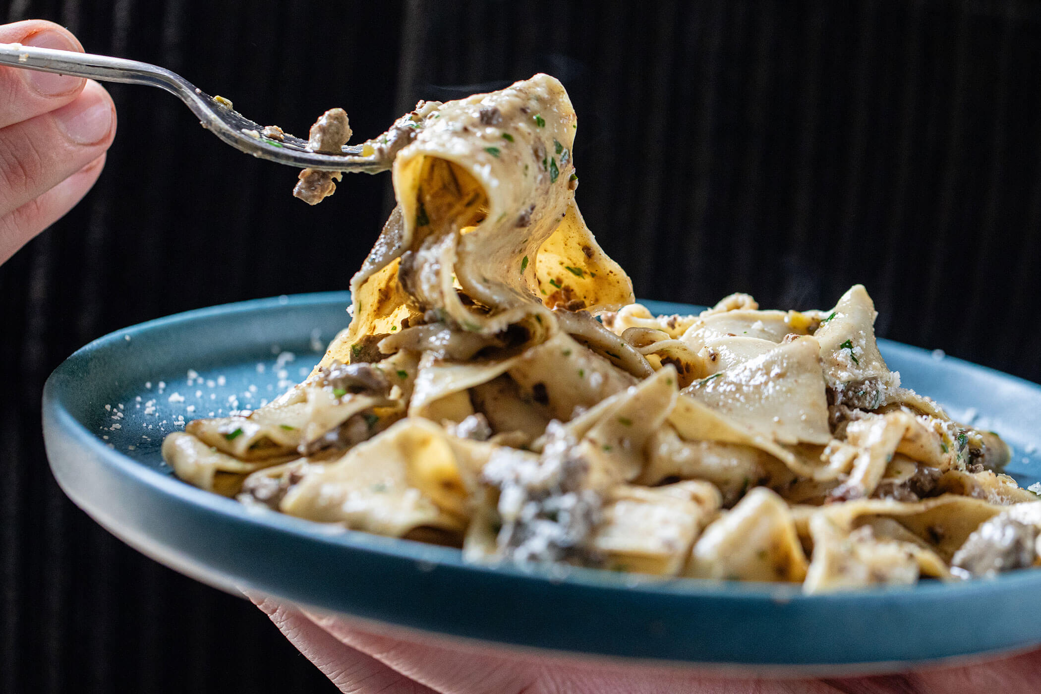 Fresh pappardelle pasta served with rich Tuscan chicken liver ragù, finished with butter and Parmesan