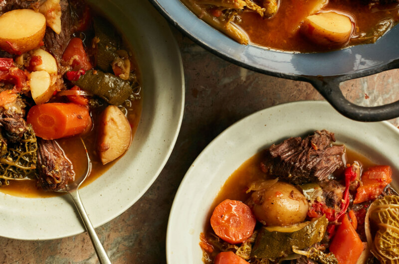 Dimlama Uzbek harvest stew with ox cheek and vegetables served in rustic bowls