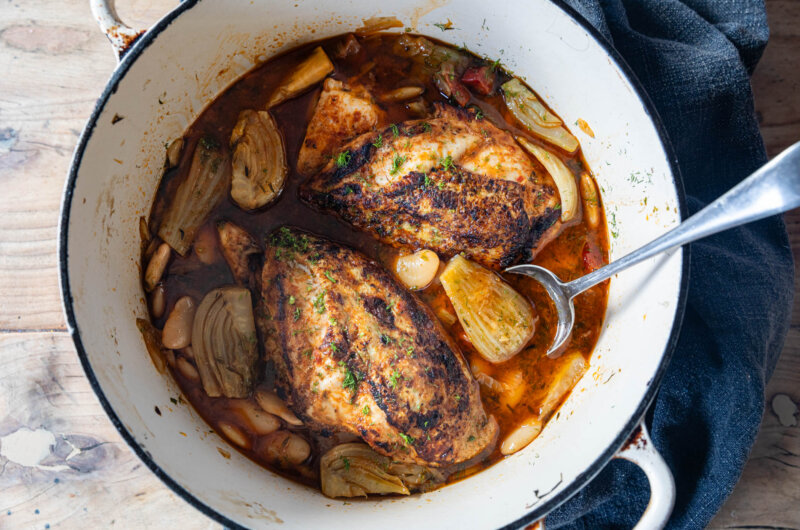 Chicken breasts with fennel and butter beans in a harissa sauce cooked in a casserole dish